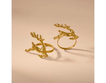 https://s3-ap-southeast-2.amazonaws.com/fusionfactory.commerceconnect.bbnt.production/pim_media/000/222/580/M_F_Xmas-26-27_CG_XMAS_DINING_S4_Reindeer_Napkin_Rings_27038301_V2_SI.jpg?1789705214