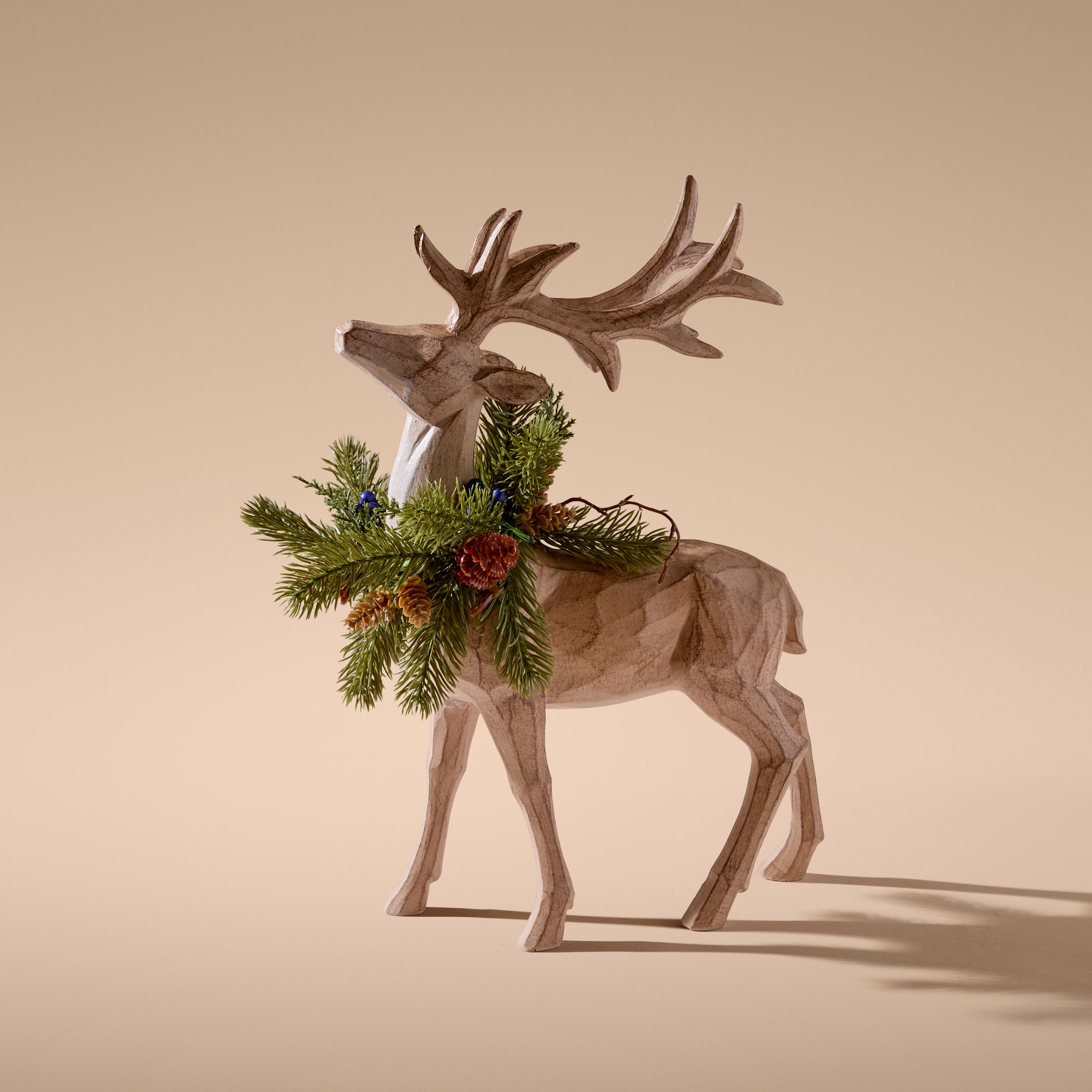 https://s3-ap-southeast-2.amazonaws.com/fusionfactory.commerceconnect.bbnt.production/pim_media/000/222/317/M_F_Xmas-26-27_HT_STAND_DECS_Resin-Reindeer-w-Faux-Wreath_27115901.jpg?1789447488