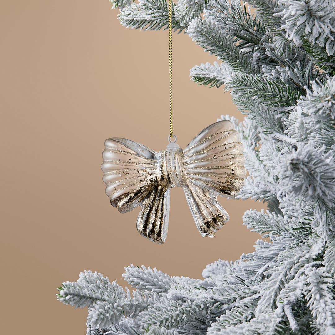 https://s3-ap-southeast-2.amazonaws.com/fusionfactory.commerceconnect.bbnt.production/pim_media/000/222/209/M_F_Xmas-26-27_LM_DECS_Glass-Glitter-Filled-Bow-Dec_27051001_0132_SI.jpg?1789362770