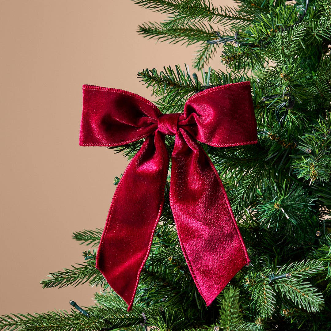https://s3-ap-southeast-2.amazonaws.com/fusionfactory.commerceconnect.bbnt.production/pim_media/000/214/610/M_F_Xmas-26-27_MR_DECS_Lrg-Velvet-Bow-Clip-Deep-Red-Deep-Red_26401101_SI.jpg?1781498155