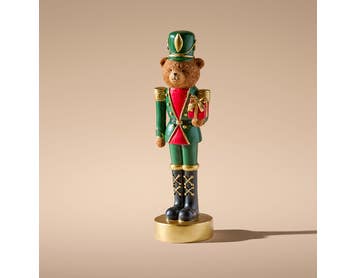 https://s3-ap-southeast-2.amazonaws.com/fusionfactory.commerceconnect.bbnt.production/pim_media/000/222/660/M_F_Xmas-26-27_MR_STAND_DECS_Resin-Bear-Nutcracker-w-Gift_27036701_SI.jpg?1789714519