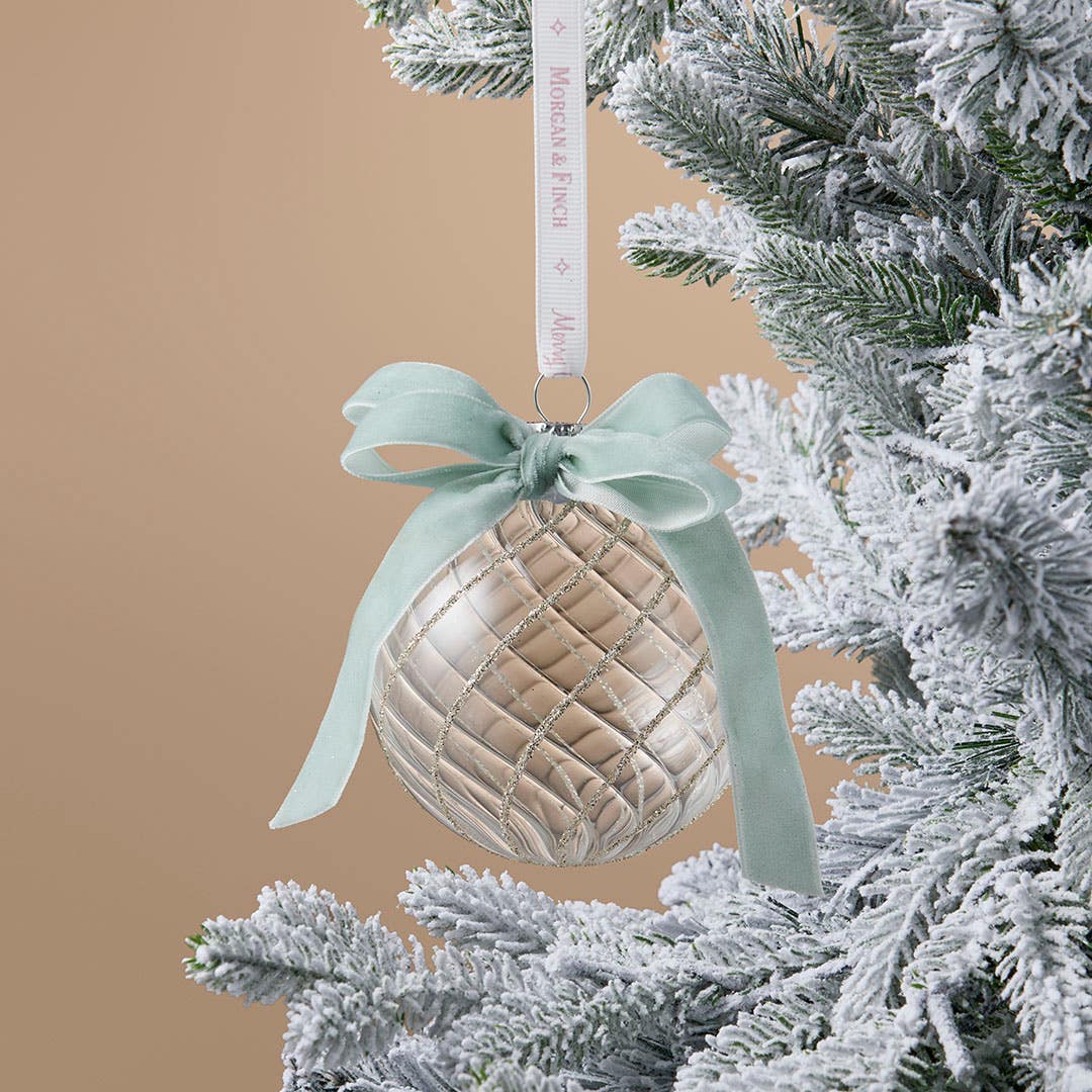 https://s3-ap-southeast-2.amazonaws.com/fusionfactory.commerceconnect.bbnt.production/pim_media/000/217/252/M_F_Xmas-26-27_S4_LM_DECS_Glass-Swirl-Ball-w-Bow_27060601_SI.jpg?1784070883