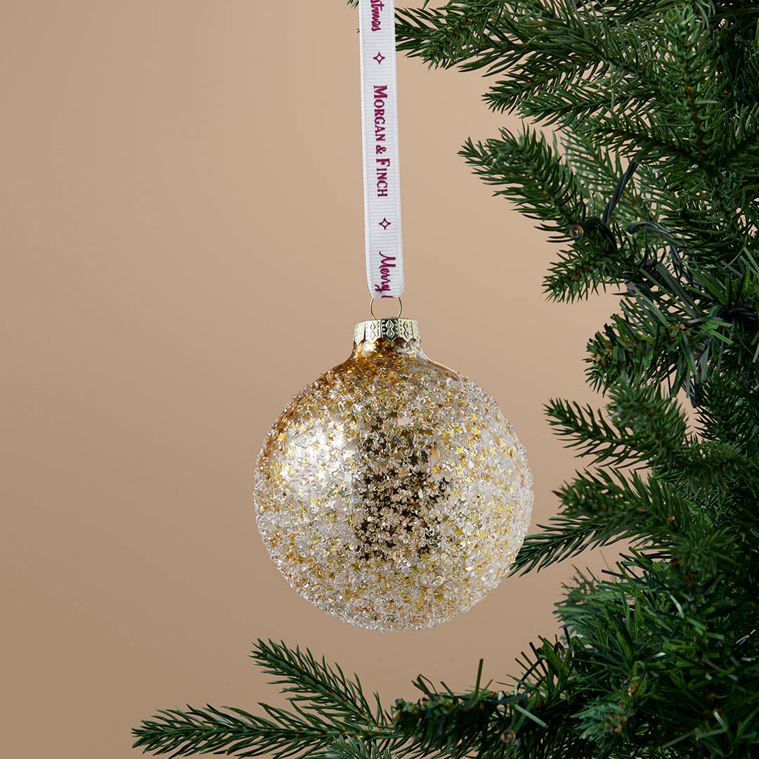 https://s3-ap-southeast-2.amazonaws.com/fusionfactory.commerceconnect.bbnt.production/pim_media/000/217/356/M_F_Xmas-26-27_S4_MR_DECS_Glass-Star-Filled-Textured-Ball_27078101_SI.jpg?1784082898